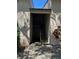 Exterior entrance to the building with stairs leading to the upper levels with the building address posted at 7506 Presley Pl # 107, Tampa, FL 33617