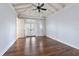 Inviting bedroom with wood floors, neutral walls, and french doors at 755 Bay Esplanade, Clearwater Beach, FL 33767
