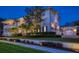 Charming multi-story home with manicured landscaping and a three-car garage at 755 Bay Esplanade, Clearwater Beach, FL 33767