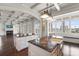 Expansive open kitchen with water views, island seating, and modern finishes at 755 Bay Esplanade, Clearwater Beach, FL 33767