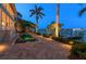 Backyard showing the pool, hot tub and view of the waterfront with the home in the background at 755 Bay Esplanade, Clearwater Beach, FL 33767