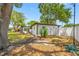 Fenced backyard with mature landscaping offering privacy and plenty of room for outdoor enjoyment at 8444 8Th N Way, St Petersburg, FL 33702