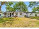 The backyard has a covered patio and mature landscaping and provides a tranquil outdoor retreat at 8444 8Th N Way, St Petersburg, FL 33702