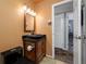 Stylish bathroom features a vanity, toilet, and new fixtures and finishes at 8444 8Th N Way, St Petersburg, FL 33702