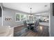 Modern dining room featuring a modern glass table and seating for six, complete with contemporary decor at 8444 8Th N Way, St Petersburg, FL 33702