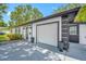 Contemporary home with well-maintained yard and attached two-car garage at 8444 8Th N Way, St Petersburg, FL 33702
