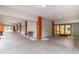 Inviting building entrance featuring seating and convenient access at 8531 Woodcrest Dr, Port Richey, FL 34668