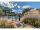 Gated community pool for residents, offering a refreshing retreat on sunny days at 8531 Woodcrest Dr, Port Richey, FL 34668