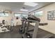 Community gym featuring treadmills, weights, and workout equipment perfect for fitness enthusiasts at 8531 Woodcrest Dr, Port Richey, FL 34668