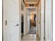 Hallway showing a clear view to multiple rooms enhancing the flow of the residence at 8531 Woodcrest Dr, Port Richey, FL 34668