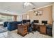 Home office with neutral wall colors and ceiling fan at 8531 Woodcrest Dr, Port Richey, FL 34668