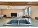 The kitchen showcases a stainless steel sink with a modern faucet and black countertops at 8531 Woodcrest Dr, Port Richey, FL 34668