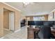 Inviting living area features tile floors, neutral walls, and a bright, welcoming atmosphere at 8531 Woodcrest Dr, Port Richey, FL 34668