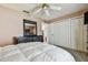 Bright bedroom boasts a neutral color scheme, ample closet space, and a comfortable ambiance at 8531 Woodcrest Dr, Port Richey, FL 34668