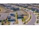 Aerial view showcasing a home with a fenced backyard, surrounded by a well-planned residential community at 9411 Lemon Drop Loop, Sun City Center, FL 33573