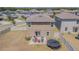 Enjoy the outdoors in this backyard featuring a patio and trampoline, great for Gathering fun at 9411 Lemon Drop Loop, Sun City Center, FL 33573