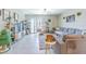Cozy living room with a large sectional sofa, decorative accents, and ample natural light at 9411 Lemon Drop Loop, Sun City Center, FL 33573