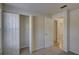 Bedroom boasts closet and access to bathroom and bedroom at 10319 Widgeon Way, New Port Richey, FL 34654