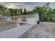 Inviting single-story home with a clean exterior and attached garage at 10319 Widgeon Way, New Port Richey, FL 34654