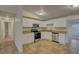 Bright kitchen with stainless steel appliances and ample cabinet space at 10319 Widgeon Way, New Port Richey, FL 34654
