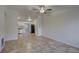 Open-concept living space featuring modern kitchen with stainless steel appliances at 10319 Widgeon Way, New Port Richey, FL 34654