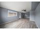 Spacious living room with luxury vinyl plank flooring and lots of natural light at 10602 Camelia Dr, Port Richey, FL 34668