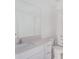 Modern bathroom with quartz counters, white cabinets and modern fixtures at 11257 Linden Depot Rd, San Antonio, FL 33576