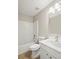 Clean bathroom features a shower-tub combo, toilet, and a vanity sink with storage at 11323 Ivy Flower Loop, Riverview, FL 33578