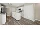 Updated kitchen with an island, modern appliances, and plenty of cabinet space for storage at 11323 Ivy Flower Loop, Riverview, FL 33578