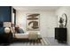 Serene bedroom with a cozy bed, refined decor, and contemporary accents throughout at 11745 E 71St Ter, Palmetto, FL 34221
