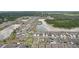Aerial shot of a residential community with well-maintained homes, ponds, and lush greenery at 13055 Willow Grove Dr, Riverview, FL 33579
