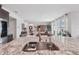 Open kitchen layout showcasing granite countertops, stylish sink, and tile floors at 13055 Willow Grove Dr, Riverview, FL 33579