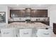 Spacious kitchen with granite counters, stainless steel appliances, and a large center island at 13055 Willow Grove Dr, Riverview, FL 33579