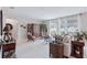 Inviting living room featuring tile floors, neutral walls, stylish furnishings, and natural light at 13055 Willow Grove Dr, Riverview, FL 33579