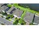 Aerial view of property with solar panels and lake view at 13130 Monach Isles Dr, Riverview, FL 33579