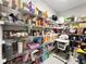 Walk-in pantry providing generous storage space with shelving at 13130 Monach Isles Dr, Riverview, FL 33579