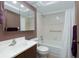 Bathroom with shower and tub combination, ample storage, and modern fixtures at 1316 Pasadena S Ave # 303, South Pasadena, FL 33707