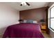 Bedroom with a ceiling fan, and large window that offers beautiful natural light at 1316 Pasadena S Ave # 303, South Pasadena, FL 33707