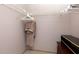 Walk-in closet with plenty of shelf space for optimal organization at 1316 Pasadena S Ave # 303, South Pasadena, FL 33707