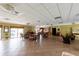 Spacious community room with tile floors, seating area, and access to the community kitchen at 1316 Pasadena S Ave # 303, South Pasadena, FL 33707