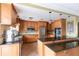 Modern kitchen featuring stainless steel appliances, granite countertops, and ample cabinet space at 1316 Pasadena S Ave # 303, South Pasadena, FL 33707