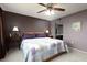 Spacious main bedroom featuring a comfortable bed and ample natural light at 1316 Pasadena S Ave # 303, South Pasadena, FL 33707