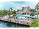 Waterfront condo community pool and clubhouse offering residents a relaxing and enjoyable recreational space at 1316 Pasadena S Ave # 303, South Pasadena, FL 33707