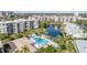 Community pool and lounge area offer a refreshing escape with ample seating and sunny ambiance at 1316 Pasadena S Ave # 303, South Pasadena, FL 33707