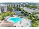 Community pool and lounge area offer a refreshing escape with ample seating and sunny ambiance at 1316 Pasadena S Ave # 303, South Pasadena, FL 33707