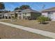 Well-maintained single-story home with a neatly landscaped yard and a welcoming front entrance at 13308 Prestwick Dr, Riverview, FL 33579