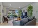 Comfortable living room with sliding door access to a patio, providing indoor-outdoor living at 13308 Prestwick Dr, Riverview, FL 33579
