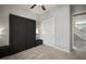 Bedroom featuring a closed murphy bed with side tables and a closet at 13311 Orca Sound Dr, Riverview, FL 33579