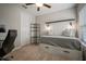 Cozy bedroom features a daybed, ceiling fan, carpet flooring, and window at 13311 Orca Sound Dr, Riverview, FL 33579