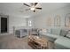 Loft featuring a comfortable seating area with stylish furniture at 13311 Orca Sound Dr, Riverview, FL 33579